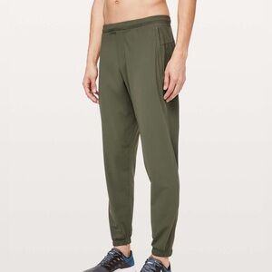 LULULEMON SURGE SIDE ZIP JOGGER PANTS FATIGUE GREEN ACTIVE WORKOUT